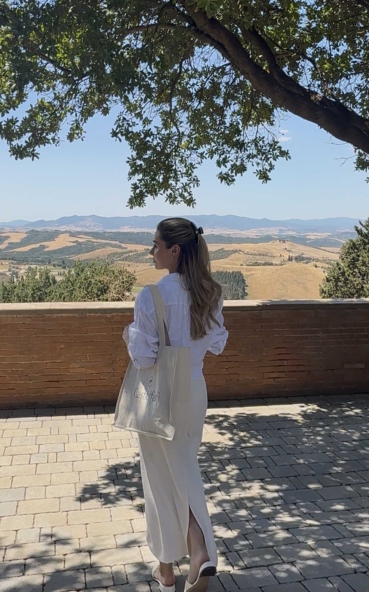 Nikki looking out over the Tuscan hills